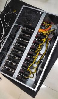 Bitcoin mining rig under operation emitting LED signals