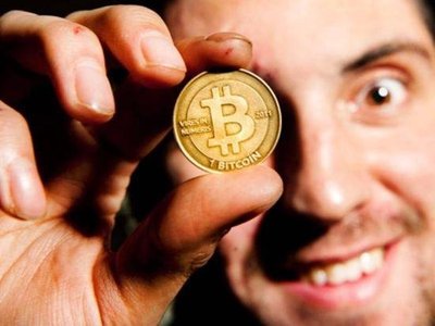 Bitcoin representation with mining rigs in the background